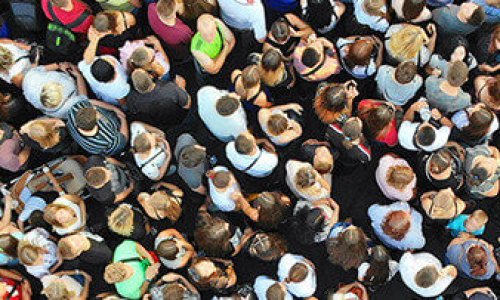 Aerial. People crowd background. Mass gathering of many people in one place. Top view.